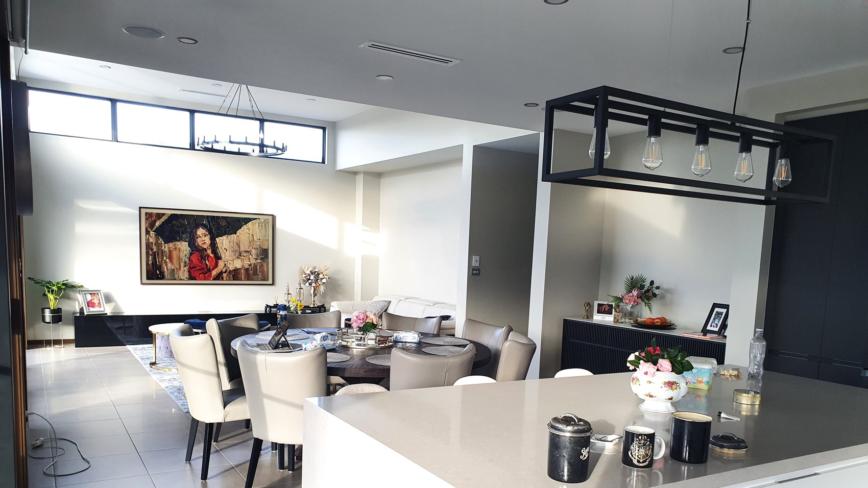 Open-plan living and dining in a private residence